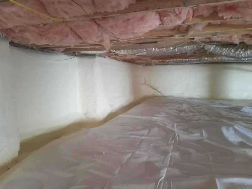 Crawl space encapsulation with closed-cell spray foam for Commercial Roof Restoration in Nuevo